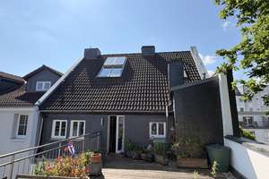 Traumhafte Eigentumswohnung mit großer Dachterrasse