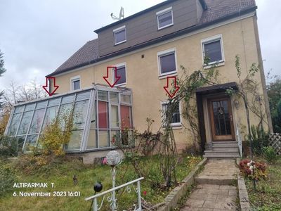 4-Zimmer-Gartenwohnung im 2-Familienhaus mit Wintergarten und 2 Carport-Stellplätzen