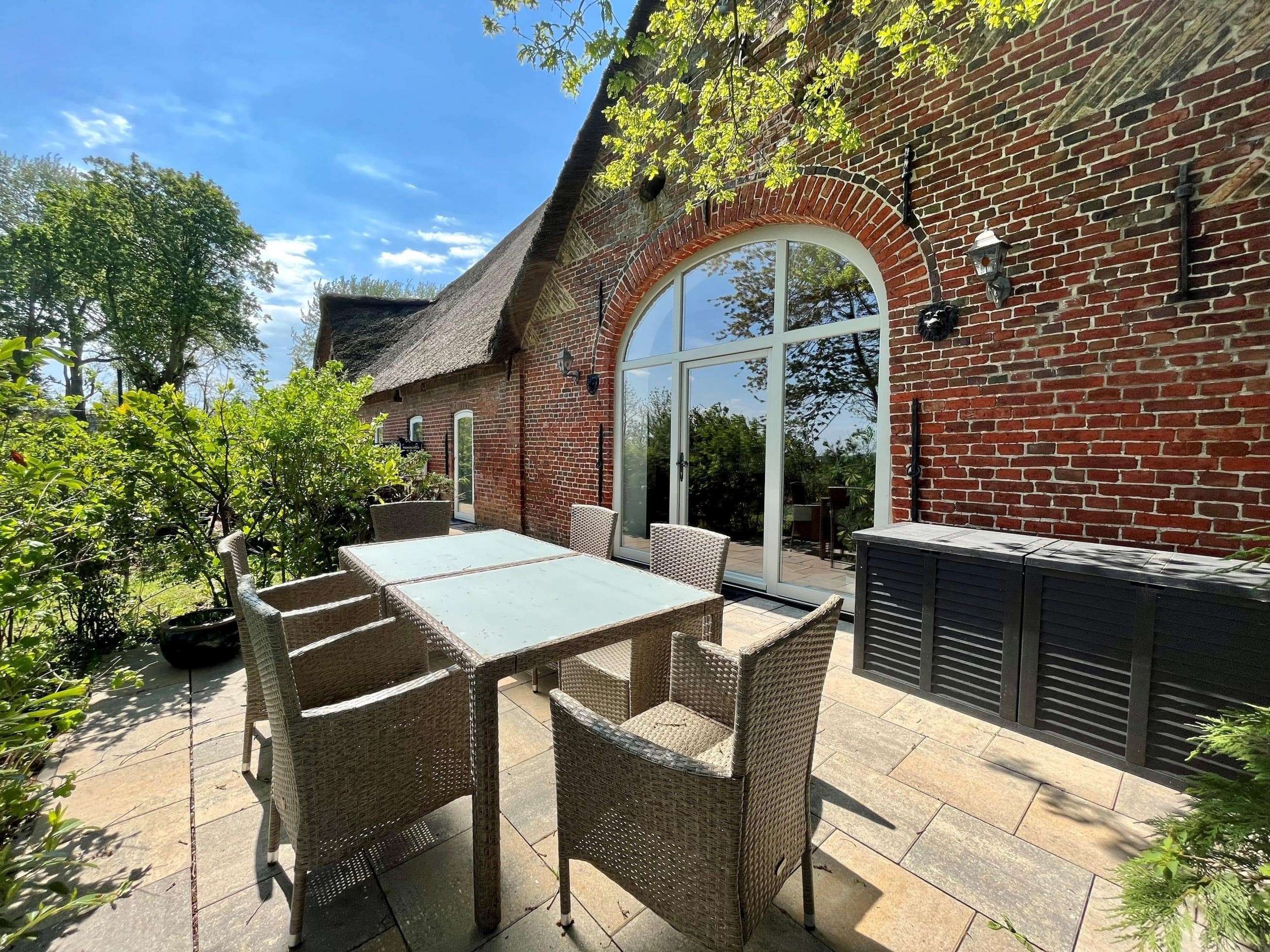 Immobilie in Tönning - Ebenerdiges Wohnen unter Reet! Zur Ferienvermietung geeignet! - Bild 1