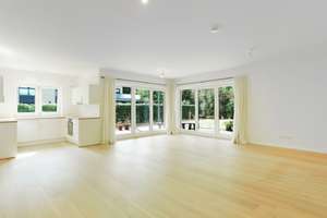 exklusives Wohnen im Herzen von Bordesholm - moderne 3 Zimmer Wohnung mit Garten und Tiefgarage 