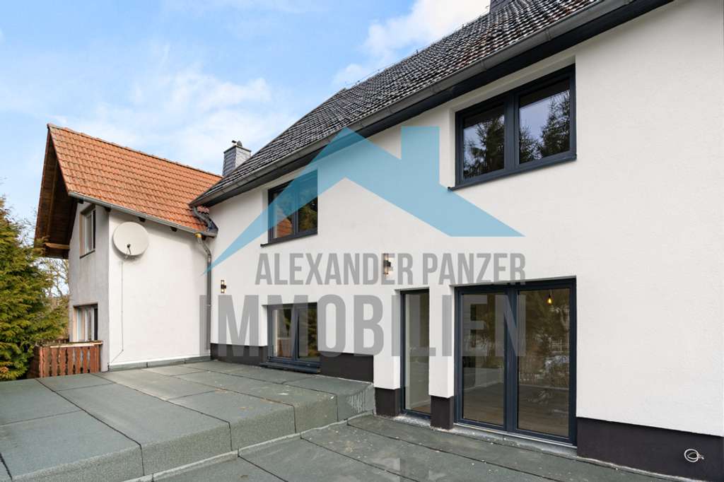 Immobilie in Habichtswald - Großzügiges und saniertes Reihenmittelhaus in ruhiger Ortsrandlage von Habichtswald-Dörnberg! - Bild 1