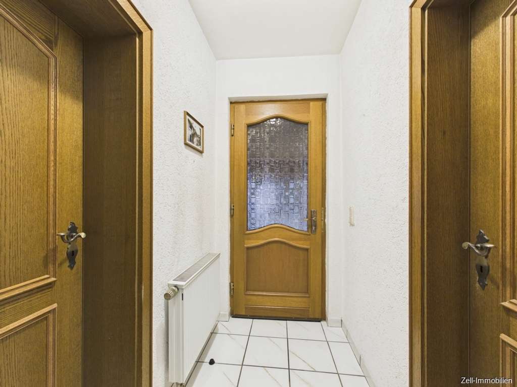 Immobilie in Bornich - Einfamilienhaus mit Garage, Werkstatt und Einliegerwohnung in Bornich zu verkaufen - Bild 3