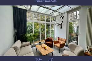 Außergewöhnlich stilvolle und hochwertige Maisonette-Wohnung mit Terrasse