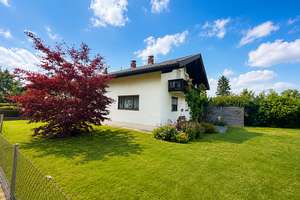 UNVERBAUBARER BERGBLICK: Einfamilienhaus auf 800 m² Traumgrundstück in Ortsrandlage