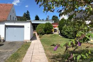 Individueller, modernisierungsbedürftiger Bungalow mit gepflegtem Garten, Garage in Nürnberg-Eibach – Die vollständige Adresse der Immobilie erhältst du vom Anbieter., 90451 Eibach, Nürnberg – Vorschaubild 2