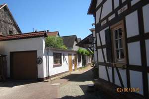 Hofreite mit denkmalgeschütztem Fachwerkhaus & Bungalow in Rüsselsheim-Königstädten – Die vollständige Adresse der Immobilie erhältst du vom Anbieter., 65428 Rüsselsheim am Main – Vorschaubild 1