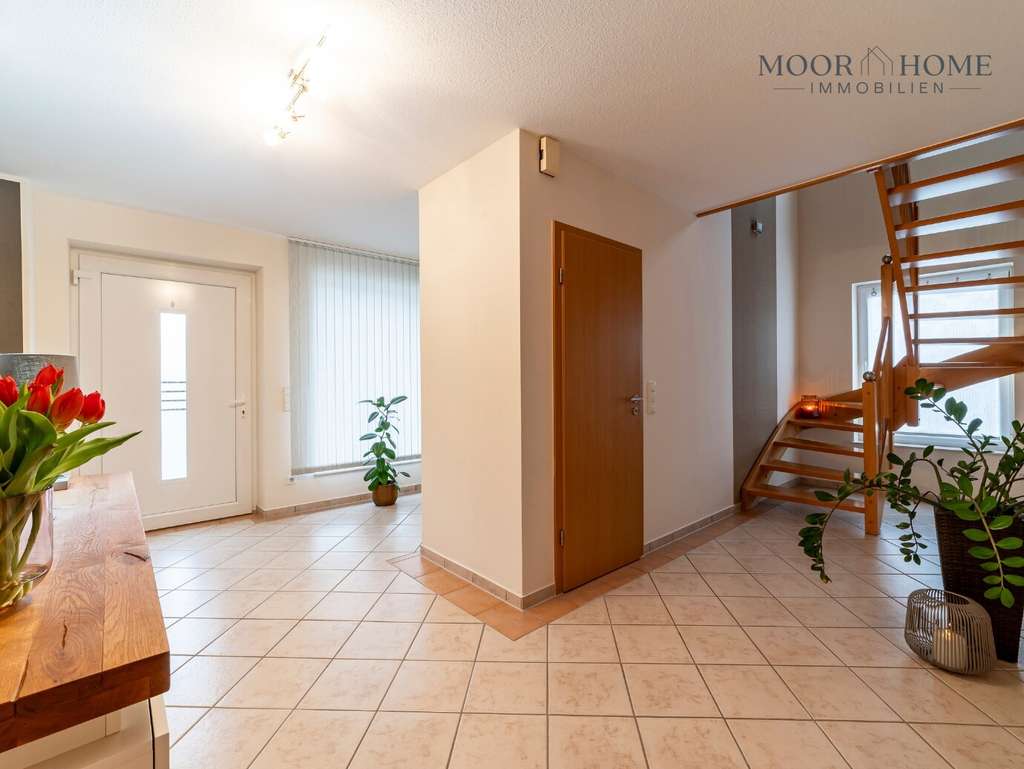 Immobilie in Emsbüren - Einfamilienhaus in Emsbüren mit Kamin, Garage und pflegeleichtem Garten - Bild 2