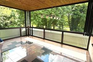 Schwabing: Große Dachterrasse / Wintergarten mit Blick ins Grüne