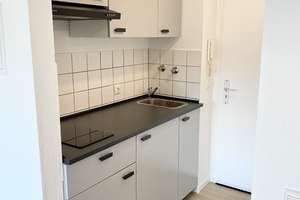Modernisierte 1-Zimmer-Wohnung mit Einbauküche im Zentrum