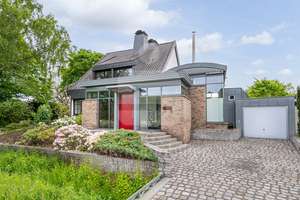 Ihr neues Zuhause: Stilvolles Einfamilienhaus mit außergewöhnlichem Wohnambiente und großem Garten!