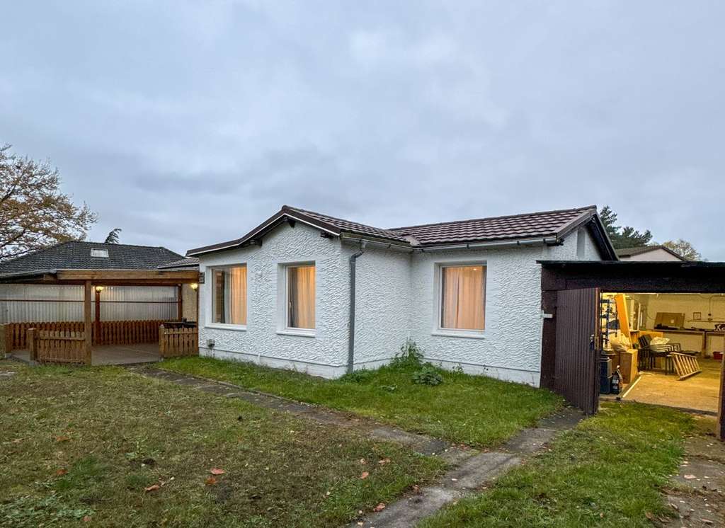 Vermieteter Bungalow auf großem Grundstück – Rendite 4%, Kaltmiete 15.600 € jährlich