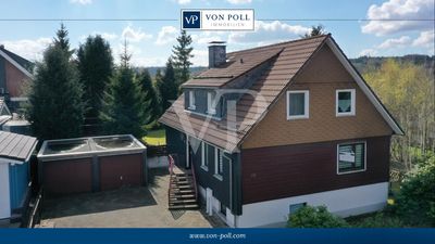 Einfamilienhaus mit ca. 155 m² Wohnfläche, 2 Garagen und einem großem Grundstück von etwa 915 m²