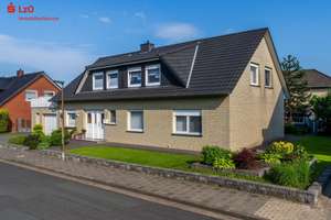 Wohnen mit vielseitigen Nutzungsmöglichkeiten – großzügiges Zweifamilienhaus in begehrter Wohnlage  – Die vollständige Adresse der Immobilie erhältst du vom Anbieter., 49401 Damme – Vorschaubild 1