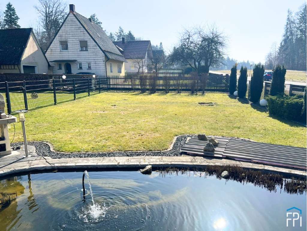 Immobilie in Ihrlerstein - Charmantes Einfamilienhaus in Ihrlerstein mit Garagen- und Werkstattgebäude - Bild 2