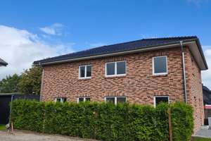 Neubauwohnung Erstbezug EG Stadtvilla Effizienshaus KfW 40 – Marktstrasse 3a, 25879 Süderstapel – Vorschaubild 1