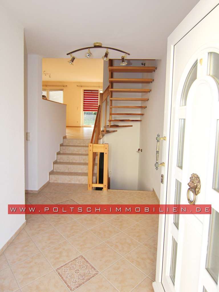 Immobilie in Bad Köstritz - Doppelhaushälfte mit Terrasse und Keller in ruhiger Lage von Bad Köstritz, BJ 2002 - Bild 1