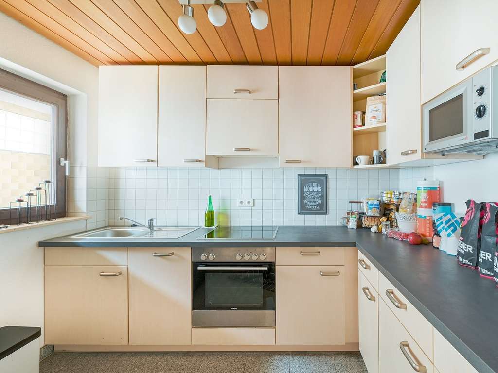 Immobilie in Pfinztal - Attraktives vollvermietetes Dreifamilienhaus mit nachhaltiger Ertragsperspektive - Bild 4