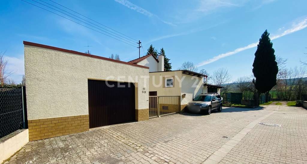 Immobilie in Flonheim - Freistehendes EFH in Feldrandlage mit tollem Garten & Garagen - Bild 2