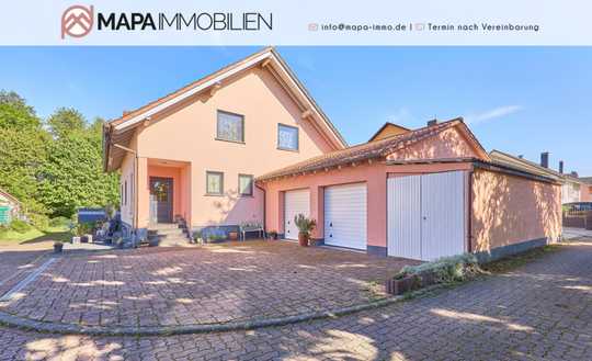 Einfamilienhaus mit Doppelgarage und großem Garten in ruhiger Lage