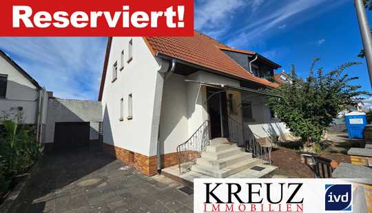 Bild von Doppelhaushälfte mit Garage und großem Grundstück