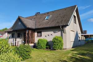 Schönes Einfamilienhaus mit Einliegerwohnung in guter und sehr ruhiger Lage – Die vollständige Adresse der Immobilie erhältst du vom Anbieter., 25746 Wesseln – Vorschaubild 1