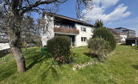 Vollvermietetes Dreifamilienhaus mit Garten in begehrter Grünlage – solide Kapitalanlage!