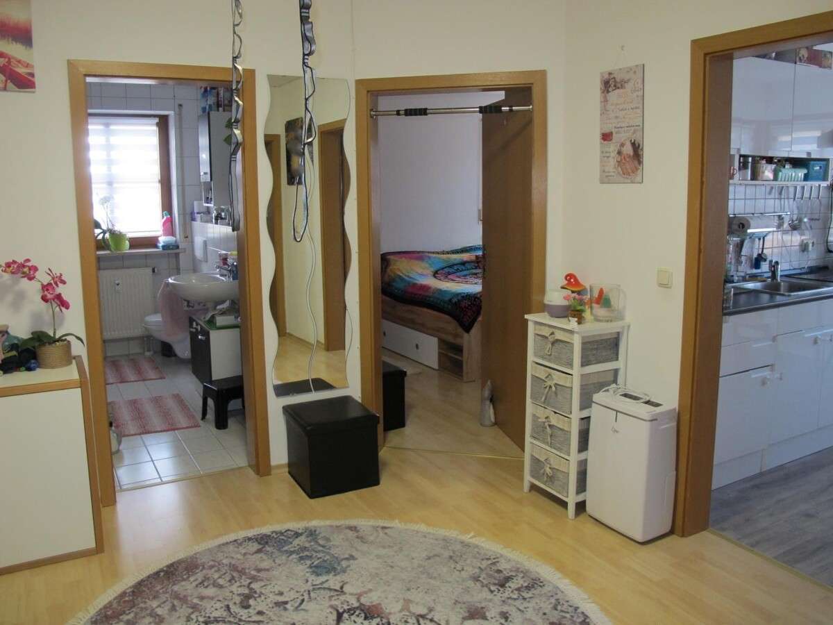 Immobilie in Mehring - Schön geschnittene 3-Zi ETW, 1. OG m. Balkon, Gartennutzung u. TG Stellplatz,  frei ab Mai/Juni 2026 - Bild 1