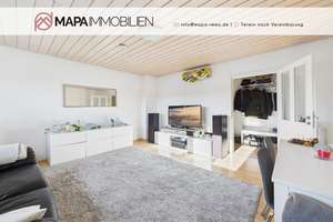 Gepflegte 3-Zimmer-Dachgeschosswohung mit Südausrichtung und Tiefgaragenstellplatz in zentraler Lage