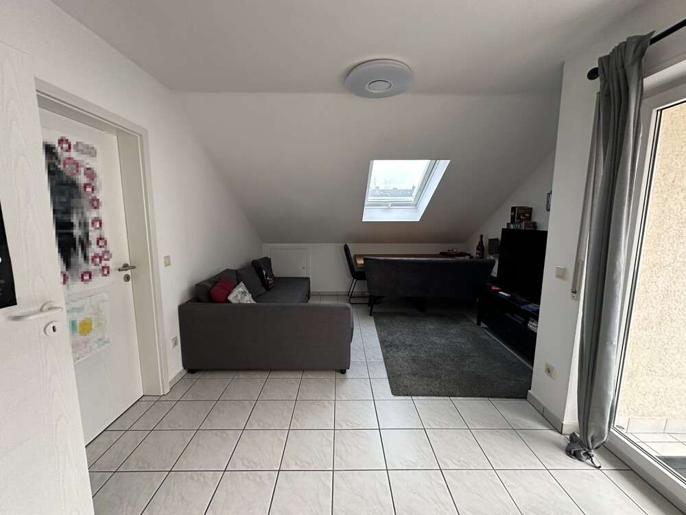 Immobilie in Obernburg am Main - Raumwunder ... Helle, gemütliche 2-Zimmer-Dachgeschosswohnung mit Balkon! - Bild 1