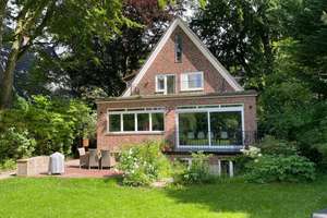 Charmantes Einfamilienhaus mit großem Südgarten in Groß Flottbek