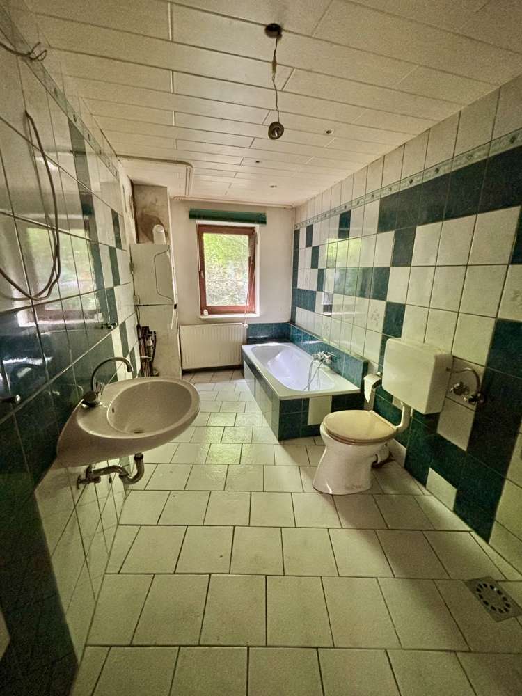 Immobilie in Schalkau - NEUER PREIS! Doppelhaushälfte mit großem Garten und Wintergarten in Schalkau! - Bild 0