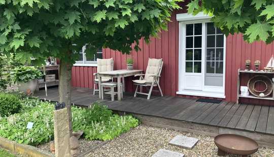 Bild von Modernes Landhaus mit idyllischem Garten und neuer Wärmepumpe