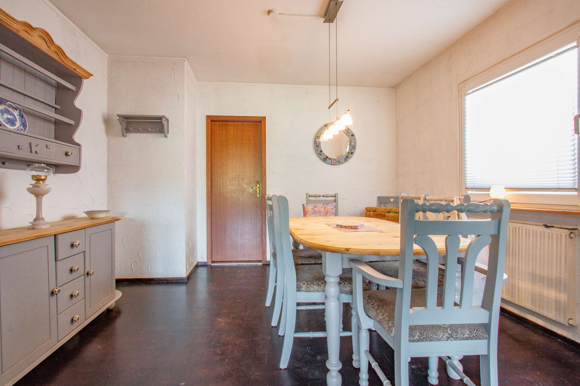 Immobilie in Detmold - Detmold-Heiligenkirchen: Idyllisches Wohnen im Grünen – charmante EG-Wohnung mit Wintergarten! - Bild 1