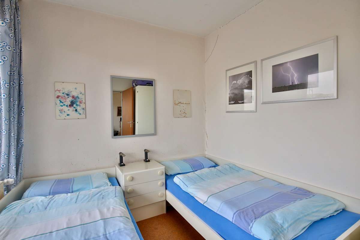 Immobilie in Wangerooge - Wohnung mit großem Süd-West-Balkon, 2 Schlafzimmer und mit viel Potenzial - Bild 0