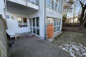 Schöne, gut vermietete EG-Wohnung mit Gartenanteil