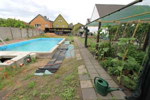 Vielseitiges Mehrfamilienhaus mit vier Wohneinheiten, großem Garten und Entwicklungspotenzial – Die vollständige Adresse der Immobilie erhältst du vom Anbieter., 64319 Pfungstadt – Vorschaubild 3