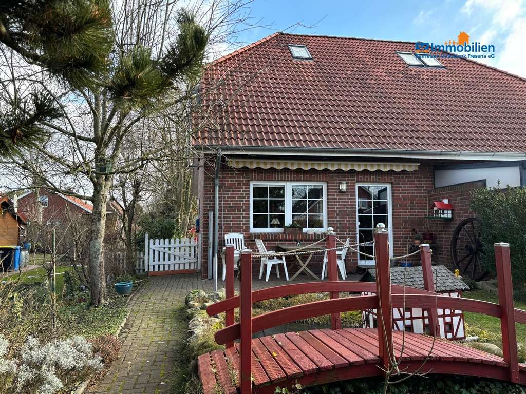 Immobilie in Großheide - Gepflegte Doppelhaushälfte in ruhiger Sackgassenlage in Großheide - Bild 0