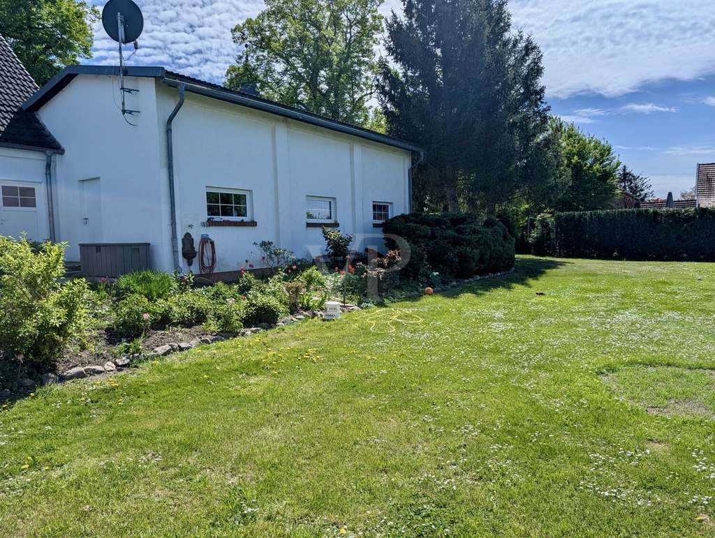 Immobilie in Schloen-Dratow - Geräumige Doppelhaushälfte auf großem Grundstück, unweit von Waren Müritz), mit Doppelgarage - Bild 4