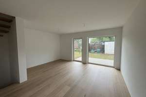 Modern semi-detached house with basement living space and carport