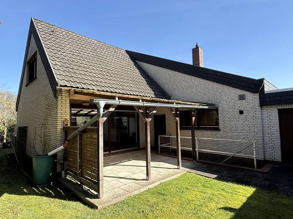 Immobilie in Wardenburg - Einfamilienhaus mit Einliegerwohnung in attraktiver Wohnlage  - Bild 1