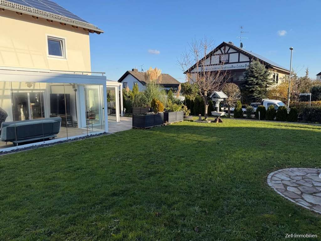 Immobilie in Geisenheim - Neuwertiges, energieeffizientes Einfamilienhaus mit Wintergarten und 801 qm großem Grundstück - Bild 4