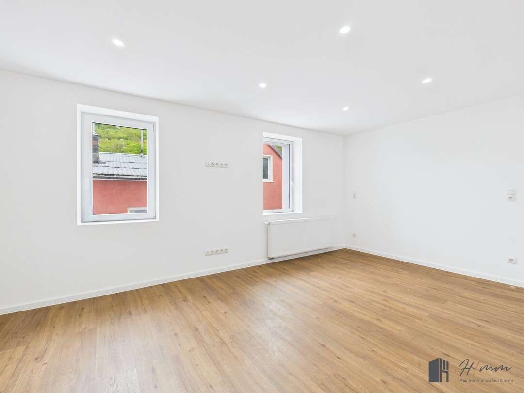 Immobilie in Rheinbrohl - Modernisiertes Reihenhaus in Rheinbrohl – Wohnen mit Rheinblick und Familienkomfort! - Bild 3