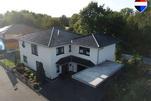 Großzügiges Einfamilienhaus in Top Lage – Wärmepumpe, Kamin, Wintergarten, Garage & Traumgarten!