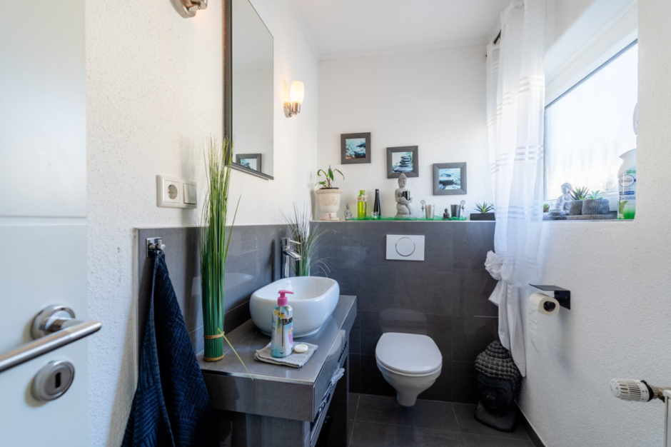 Immobilie in Mendig - Stilvoller Bungalow mit Balkon und herrlichem Garten - Bild 1