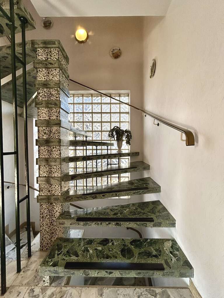 Handwerkerhaus mit Garage und Wintergarten