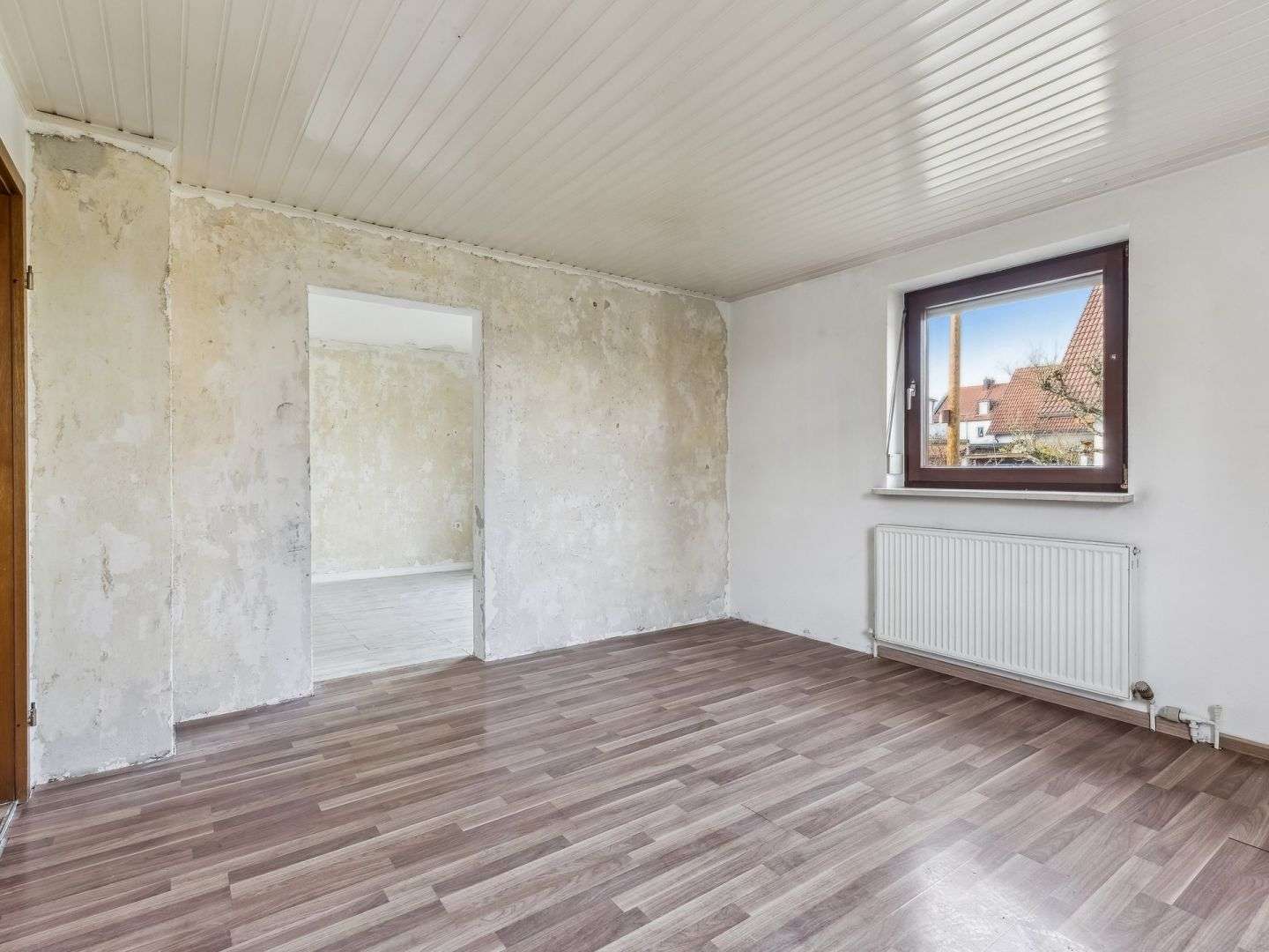 Immobilie in Eichenau - Charmante Doppelhaushälfte mit Renovierungsbedarf auf großzügigem Grundstück in Eichenau - Bild 1