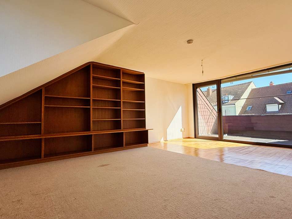 Dachgeschosszimmer mit Loggia