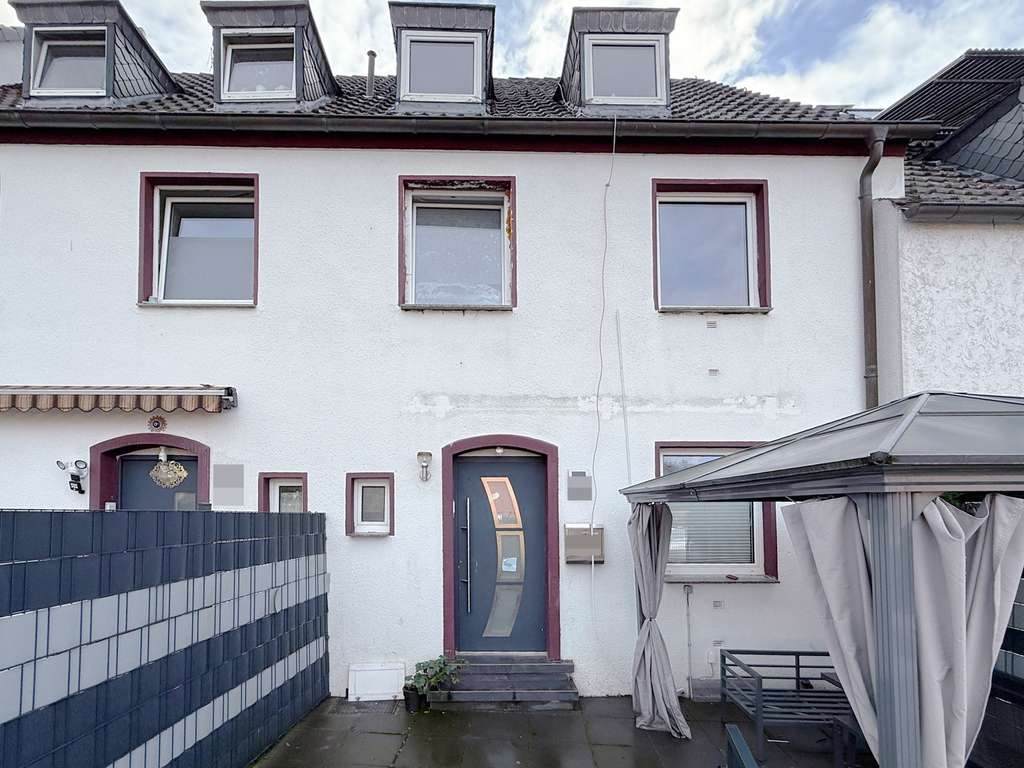 Immobilie in Hemer - Hemer-Bredenbruch - Reihenmittelhaus mit Einbauküche, Terrasse und Garage - Bild 1