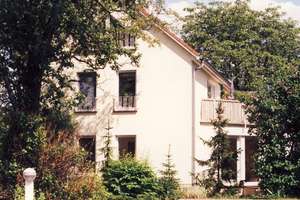 Komfortable Wohnung im EG mit kleinem Garten