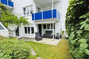 3,5 Zimmer Wohnung mit Terrasse und Gartenanteil
